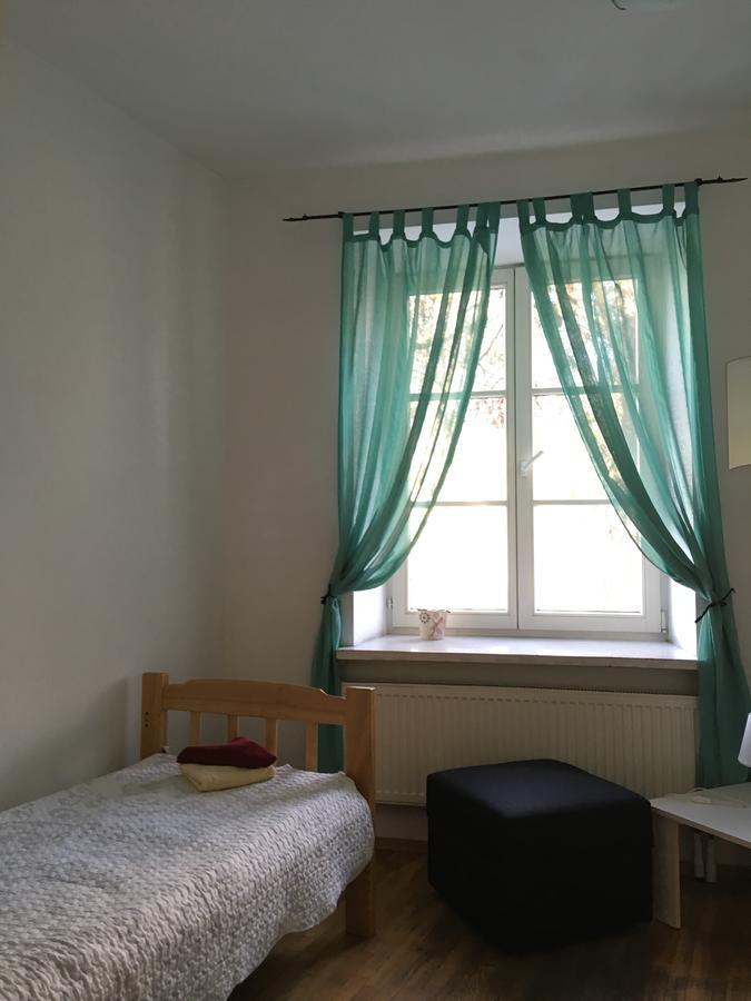 Pogo Hostel Vilna Exterior foto A window with curtains